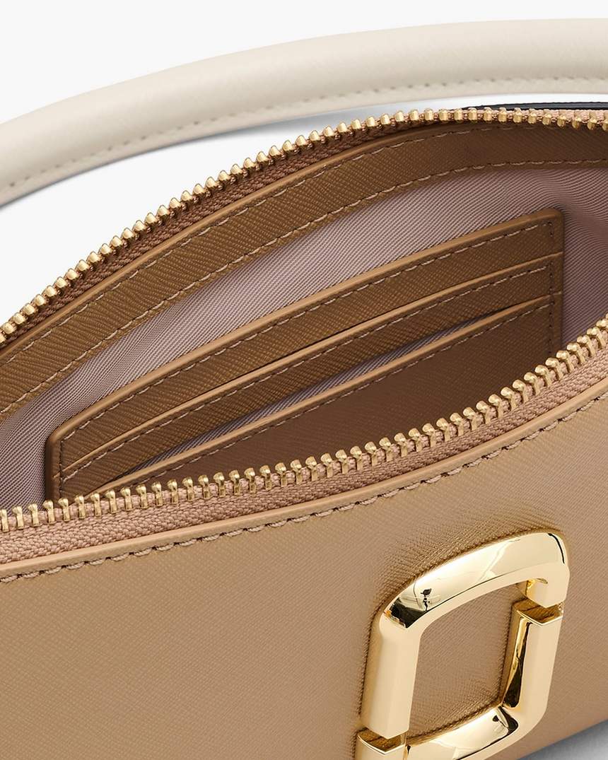 de snapshot convertible schoudertas