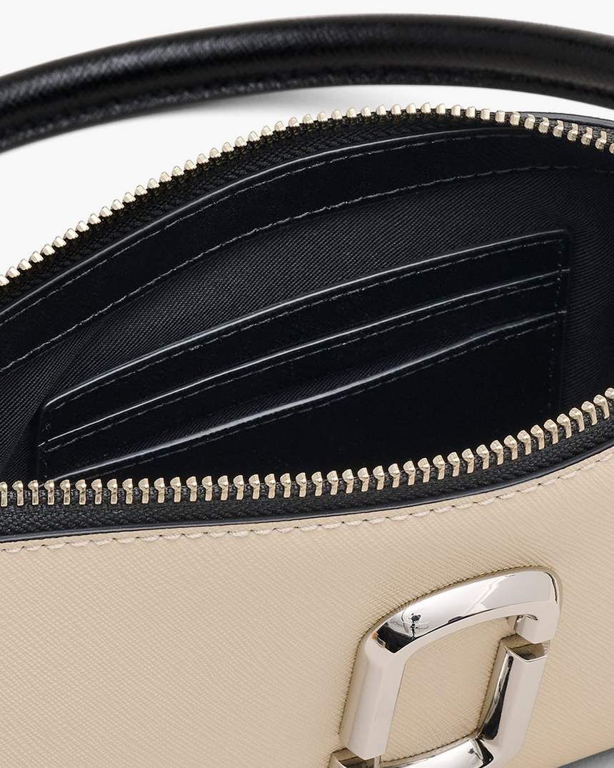 de snapshot convertible schoudertas