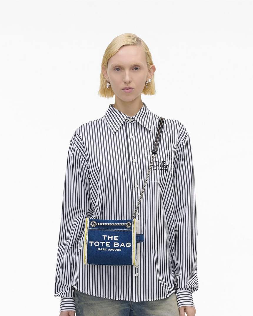 de denim crossbodytas met ketting