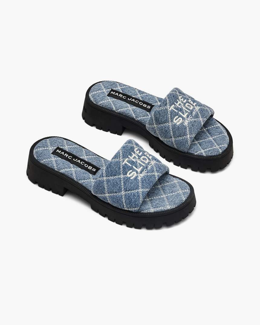 de gewatteerde denim slipper met profielzool