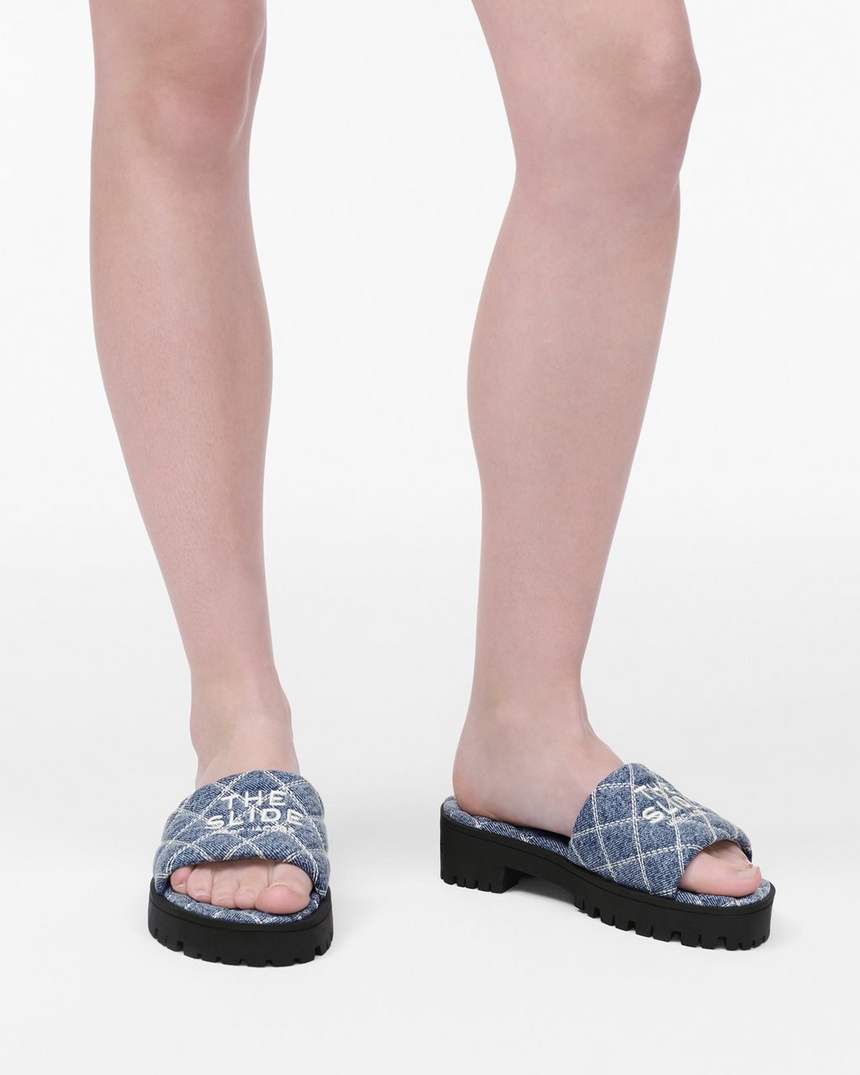 de gewatteerde denim slipper met profielzool