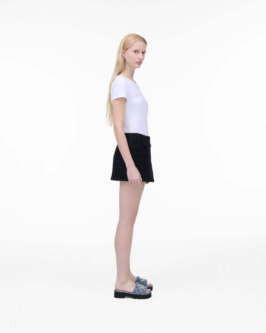 de gewatteerde denim slipper met profielzool
