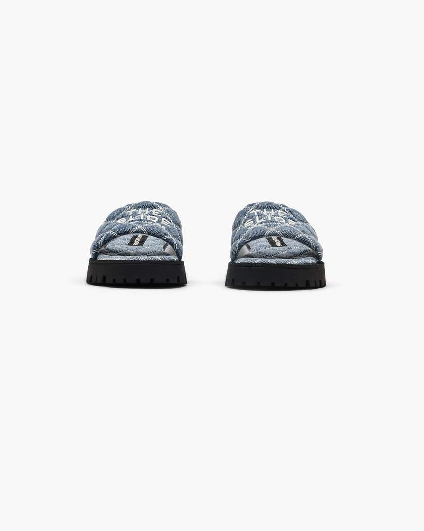 de gewatteerde denim slipper met profielzool