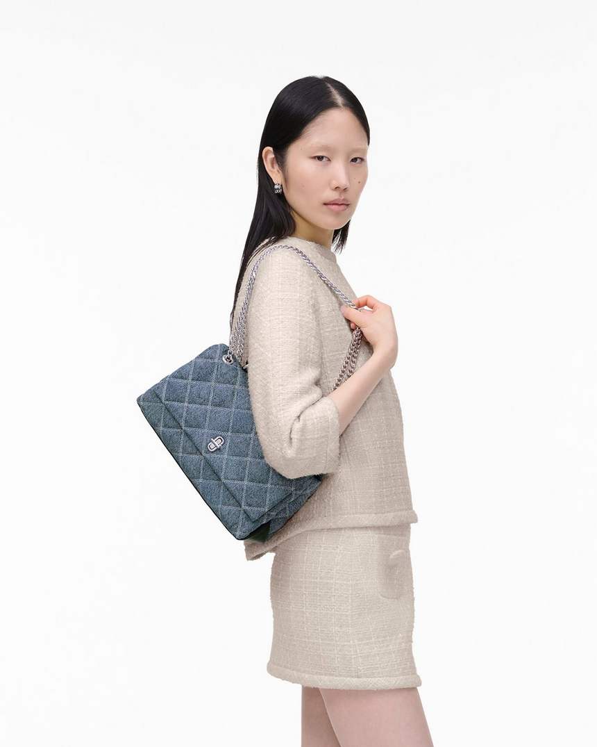 de gewatteerde denim schoudertas met dubbele ketting