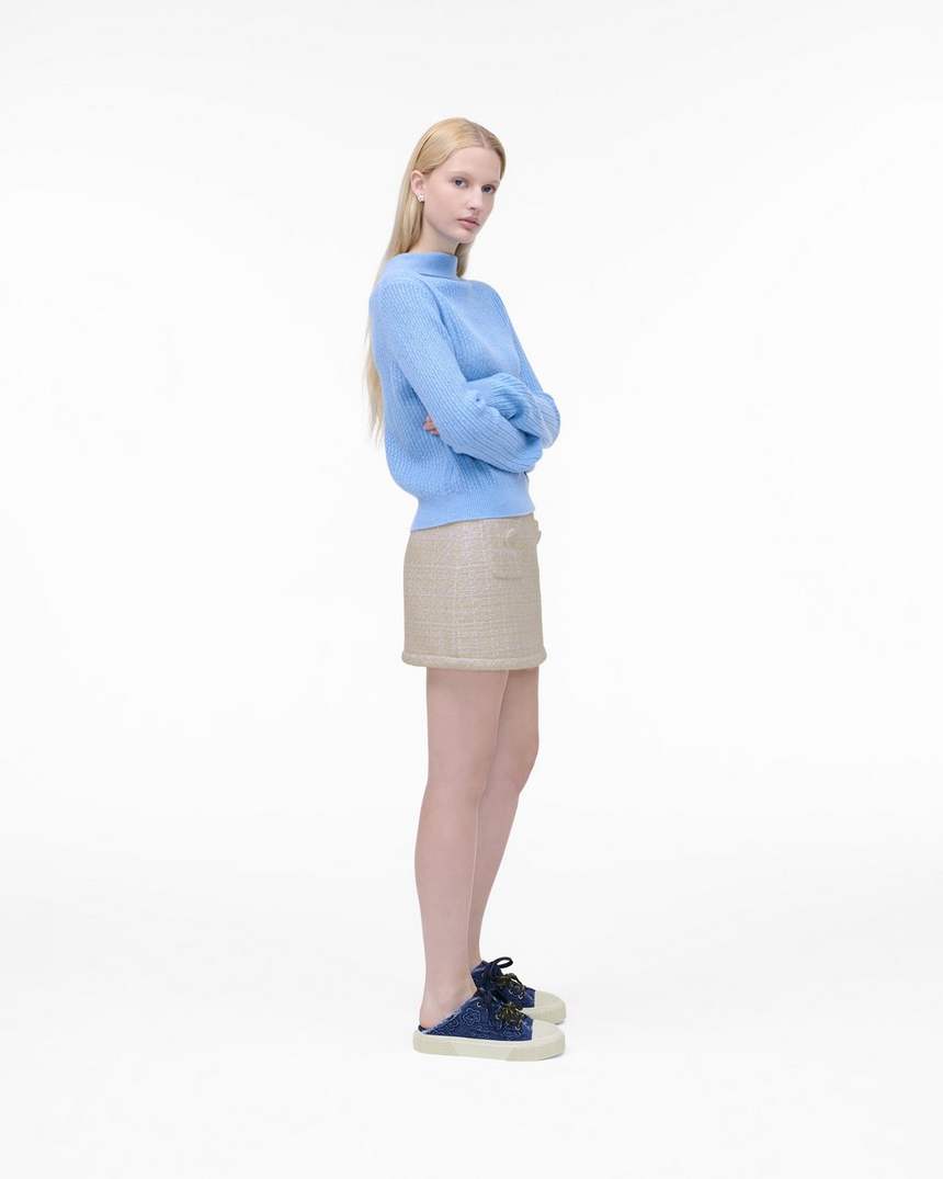 de puffy daisy denim sneaker mule