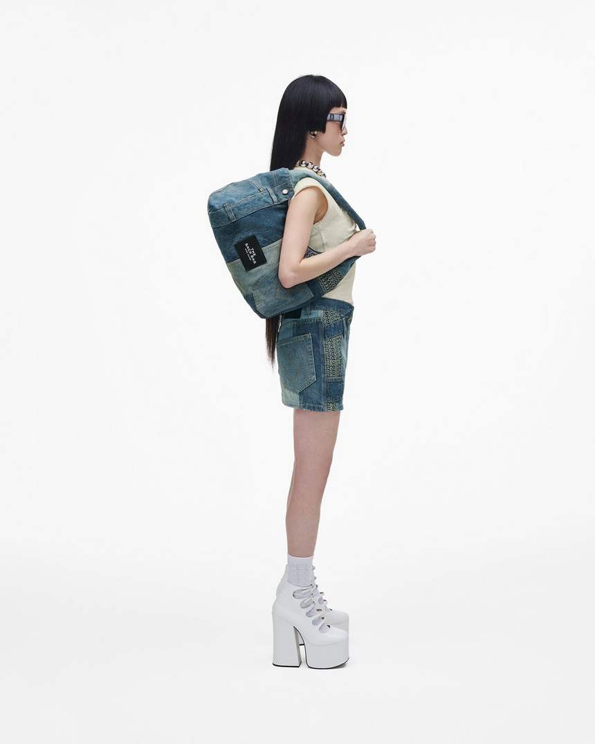 de gedemonteerde denim zaktas