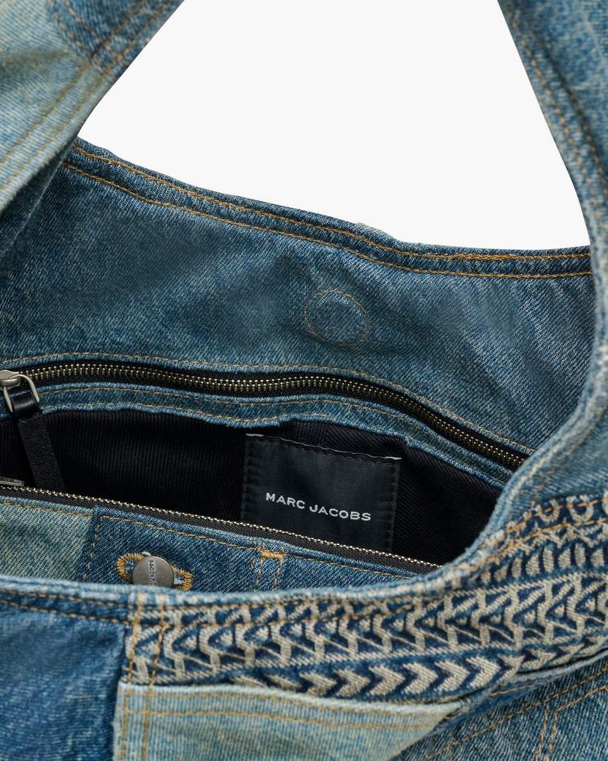 de gedemonteerde denim zaktas