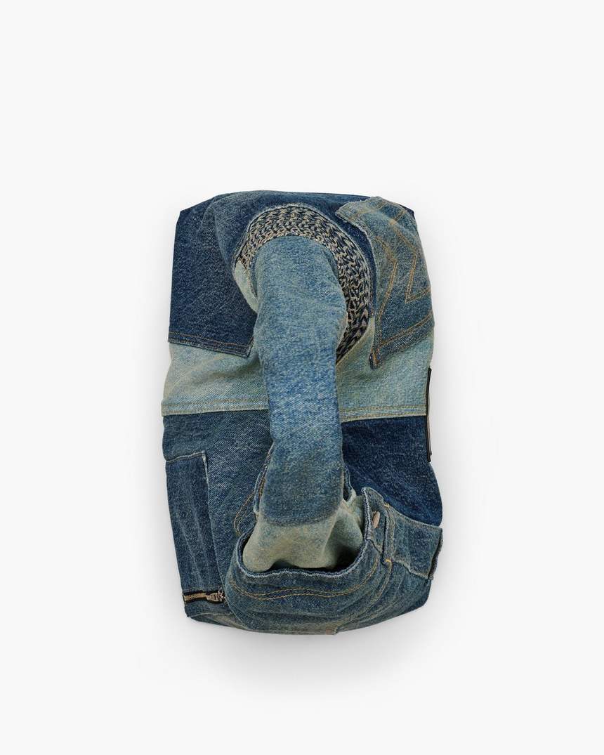 de gedemonteerde denim zaktas