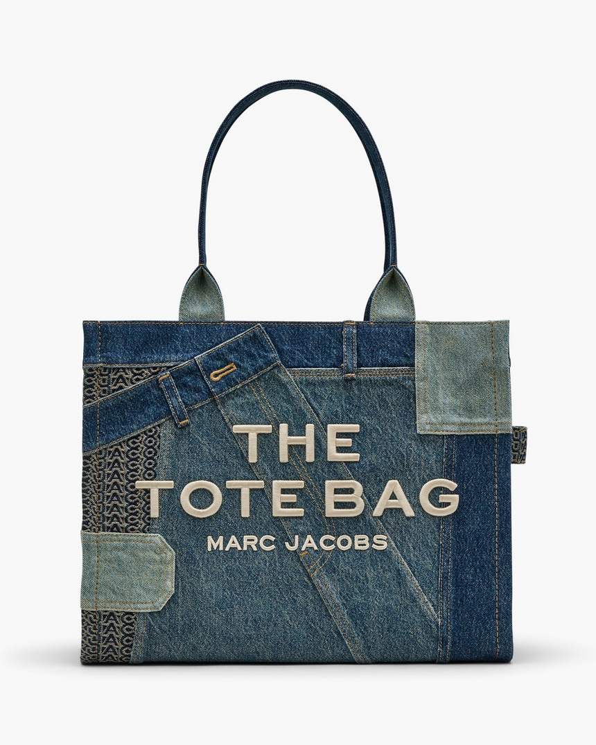 de grote draagtas van gedeconstrueerd denim