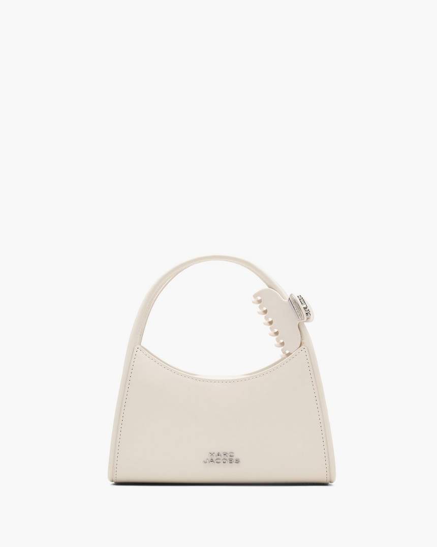 de claw clip crossbodytas