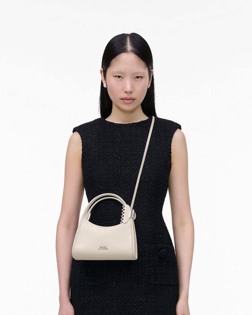 de claw clip crossbodytas
