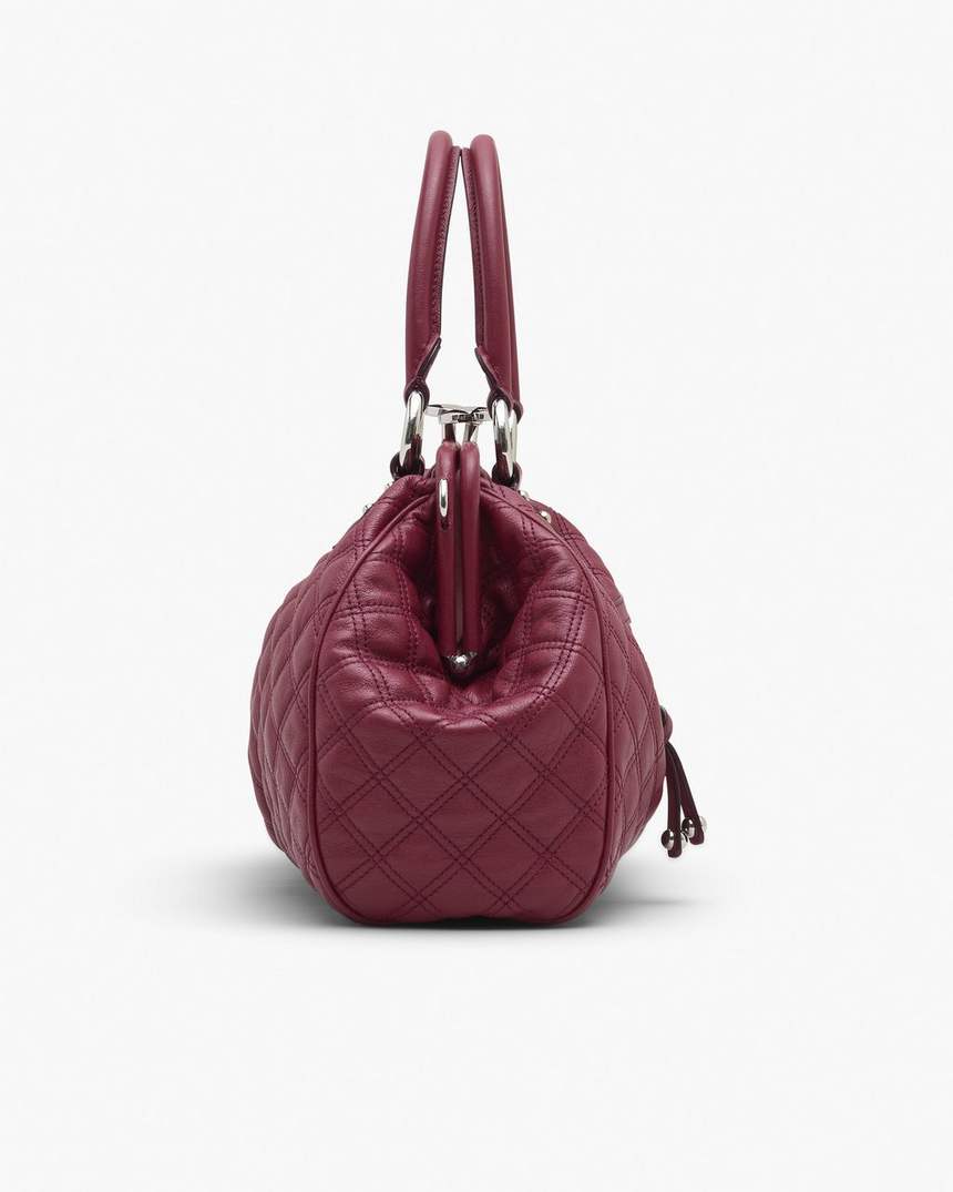 re-edition gewatteerde leren stam-tas