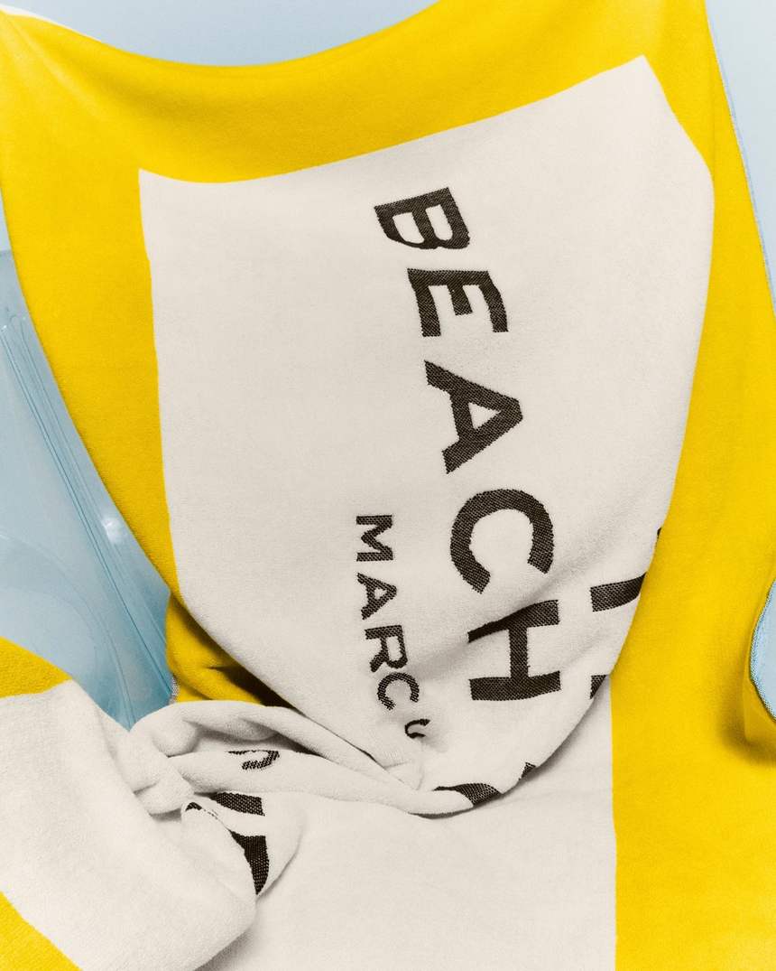 de strandhanddoek