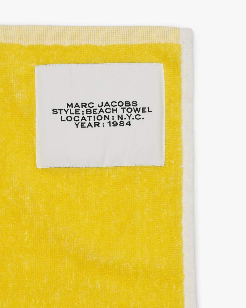 de strandhanddoek